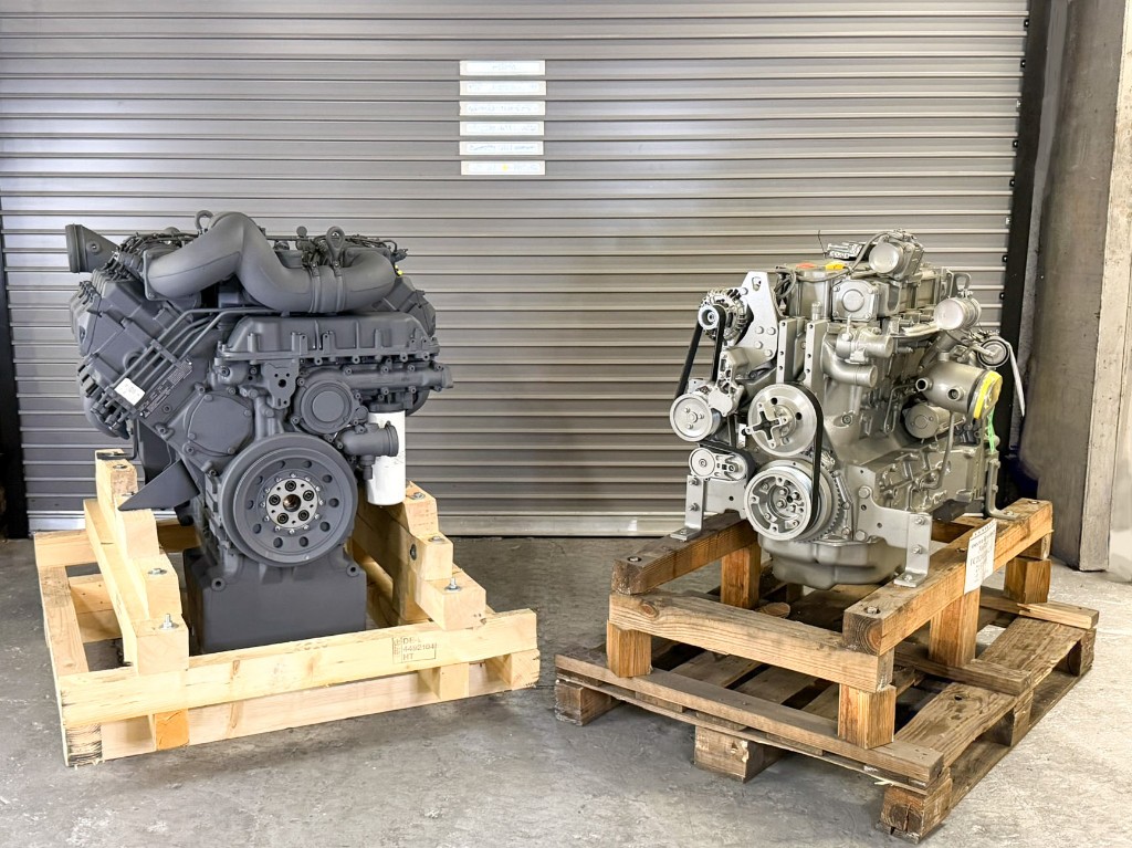 Replacement diesel engines on pallets in warehouse